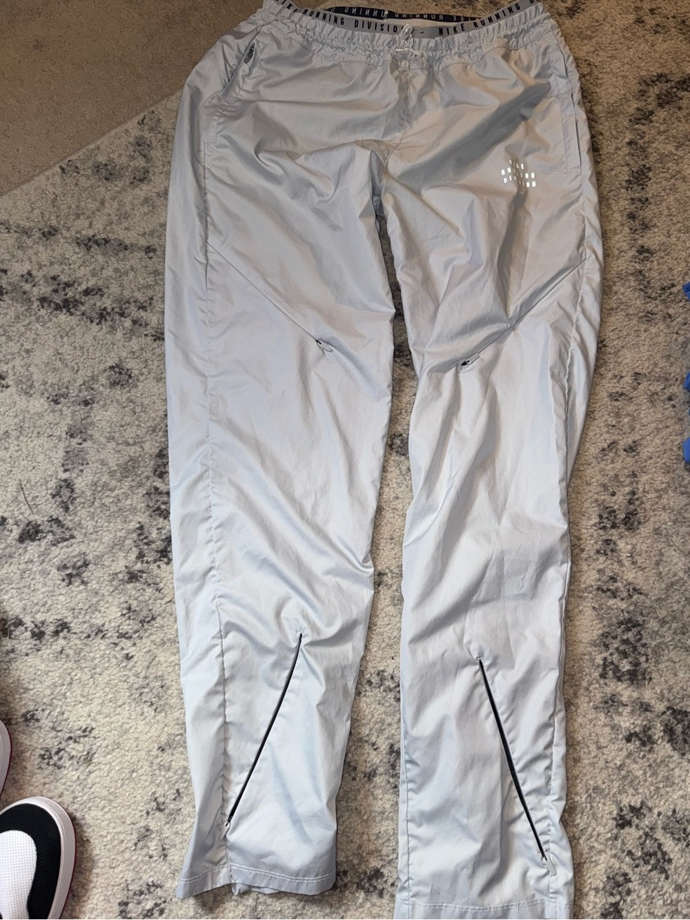 Nike running division grey track pants